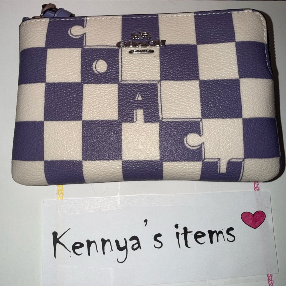 Corner zip wristlet in checkered print